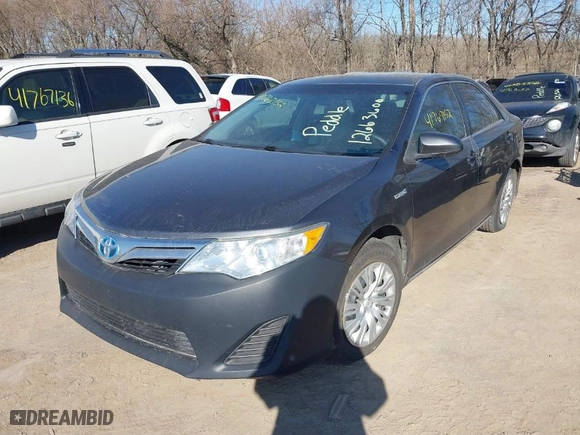 2013 Toyota Camry Hybrid LE with VIN 4T1BD1FK9DU081974, listed as a IAAI auction lot 41767152 with 188,059 mi miles. Bid and sale history available at carsss.com. Image 2.