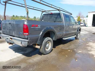 2003 Ford Super Duty F-350 SRW XL with VIN 1FTSW31P23EC92360, listed as a IAAI auction lot 42042773 with 299,010 mi miles. Bid and sale history available at carsss.com. Image 4.