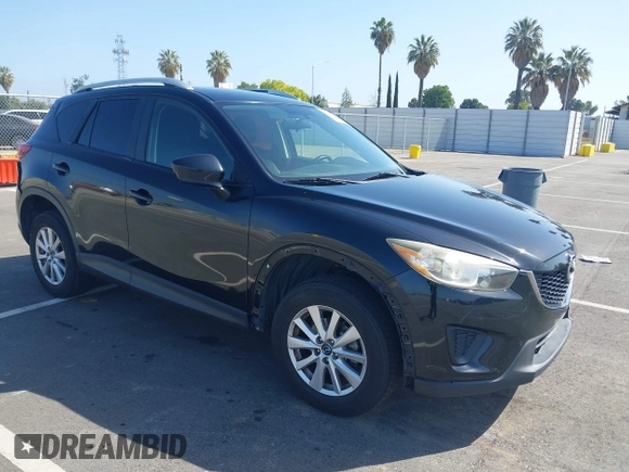 2014 Mazda CX-5 Sport z VIN JM3KE2BE8E0371775, wystawiony jako IAAI lot #42111417 z przebiegiem 150 932 mil mil oraz . Historia ofert i sprzedaży dostępna na DreamBid. Obrazek 1.