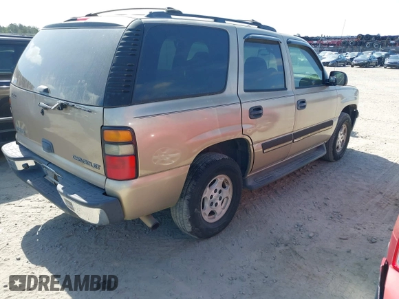2005 Chevrolet Tahoe LS with VIN 1GNEC13V65J249079, listed as a IAAI auction lot 42127866 with 243,705 mi miles. Bid and sale history available at carsss.com. Image 4.