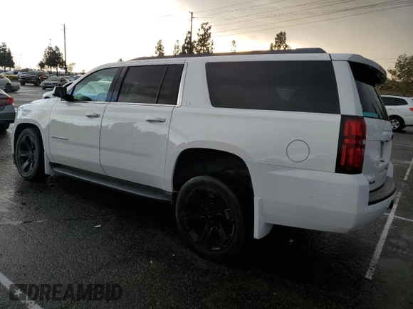 2015 Chevrolet Suburban LS with VIN 1GNSCHKC9FR667540, listed as a Copart auction lot 80908574 with 125,428 mi miles and Salvage title. Bid and sale history available at DreamBid. Image 2.