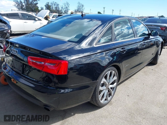 2014 Audi A6 2.0T Premium Plus with VIN WAUGFAFC7EN028549, listed as a IAAI auction lot 41948470 with 141,557 mi miles. Bid and sale history available at carsss.com. Image 4.