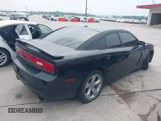 2014 Dodge Charger RT z VIN 2C3CDXCT2EH123810, wystawiony jako IAAI lot #42284705 z przebiegiem 171 159 mil mil oraz . Historia ofert i sprzedaży dostępna na DreamBid. Obrazek 4.
