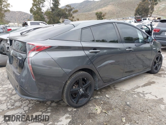 2016 Toyota Prius Four with VIN JTDKARFU8G3015083, listed as a IAAI auction lot 42191765 with 168,820 mi miles and . Bid and sale history available at DreamBid. Image 4.
