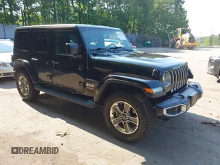 2019 Jeep Wrangler Unlimited Sahara with VIN 1C4HJXEN5KW621649, listed as a IAAI auction lot 42461506 with 49,235 mi miles and . Bid and sale history available at DreamBid. Image 1.