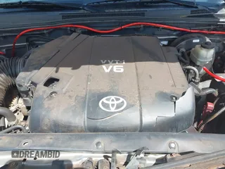 2014 Toyota Tacoma with VIN 3TMLU4EN3EM159080, listed as a IAAI auction lot 41809259 with 113,950 mi miles and . Bid and sale history available at DreamBid. Image 10.