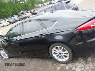 2020 Ford Fusion SE z VIN 3FA6P0HD5LR178607, wystawiony jako IAAI lot #42094774 z przebiegiem 123 341 mil mil oraz . Historia ofert i sprzedaży dostępna na DreamBid. Obrazek 13.