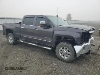 2015 Chevrolet Silverado 3500HD LTZ with VIN 1GC4K0C82FF676758, listed as a Copart auction lot 77458684 with 173,579 mi miles and Salvage Title. Bid and sale history available at DreamBid. Image 4.