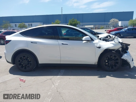 2023 Tesla Model Y Long Range with VIN 7SAYGDEE8PF612438, listed as a IAAI auction lot 41991145 with 29,775 mi miles and . Bid and sale history available at carsss.com. Image 13.