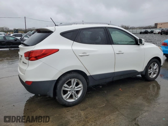 2013 Hyundai Tucson GLS with VIN KM8JU3AC0DU770079, listed as a Copart auction lot 52639835 with 212,894 mi miles and Clean Title. Bid and sale history available at carsss.com. Image 3.