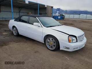 2004 Cadillac DeVille DTS z VIN 1G6KF57944U122824, wystawiony jako Copart lot #86147994 z przebiegiem 118 156 mil mil oraz Szkody całkowita. Historia ofert i sprzedaży dostępna na DreamBid. Obrazek 4.