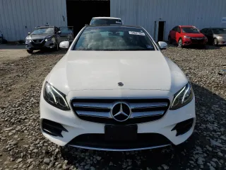 2019 Mercedes-Benz E 300 with VIN WDDZF4KB9KA520910, listed as a Copart auction lot 54697765 with 69,324 mi miles and Salvage title. Bid and sale history available at DreamBid. Image 5.