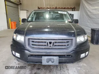2013 Honda Ridgeline RTL with VIN 5FPYK1F57DB008861, listed as a Copart auction lot 55998335 with 226,567 mi miles and Salvage title. Bid and sale history available at DreamBid. Image 5.