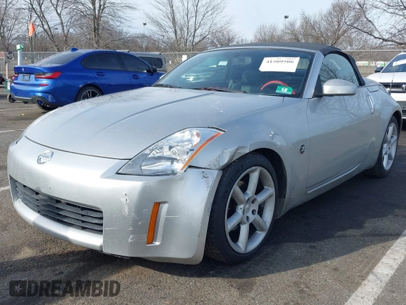 2005 Nissan 350Z Touring z VIN JN1AZ36A05M755776, wystawiony jako IAAI lot #41509506 z przebiegiem 79 148 mil mil oraz . Historia ofert i sprzedaży dostępna na DreamBid. Obrazek 18.