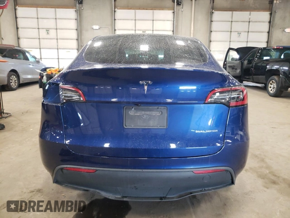 2023 Tesla Model Y Long Range with VIN 7SAYGDEE7PA180793, listed as a Copart auction lot 46706855 with 18,136 mi miles and Non Repairable. Bid and sale history available at DreamBid. Image 6.