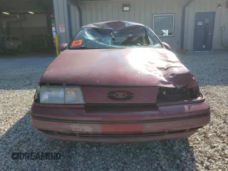 1990 Ford Taurus z VIN 1FACP54Y5LA145772, wystawiony jako Copart lot #69129894 z przebiegiem 617 051 mil mil oraz Czysty tytuł • Clean title. Historia ofert i sprzedaży dostępna na DreamBid. Obrazek 5.