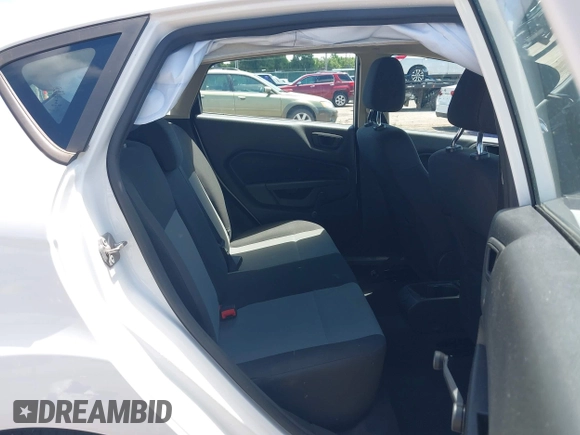 2016 Ford Fiesta S with VIN 3FADP4TJ9GM185722, listed as a IAAI auction lot 42436083 with 69,256 mi miles and . Bid and sale history available at DreamBid. Image 8.