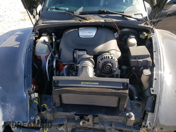 2005 Chevrolet SSR LS z VIN 1GCES14H35B121137, wystawiony jako Copart lot #77892444 z przebiegiem 89 997 mil mil oraz Szkoda całkowita • Salvage title. Historia ofert i sprzedaży dostępna na DreamBid. Obrazek 11.