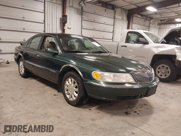 2001 Lincoln Continental with VIN 1LNHM97V11Y691910, listed as a IAAI auction lot 41501779 with 102,715 mi miles and . Bid and sale history available at DreamBid. Image 1.