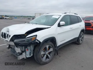 2019 Jeep Cherokee Limited z VIN 1C4PJMDXXKD456514, wystawiony jako IAAI lot #42287253 z przebiegiem 58 451 mil mil oraz . Historia ofert i sprzedaży dostępna na DreamBid. Obrazek 2.