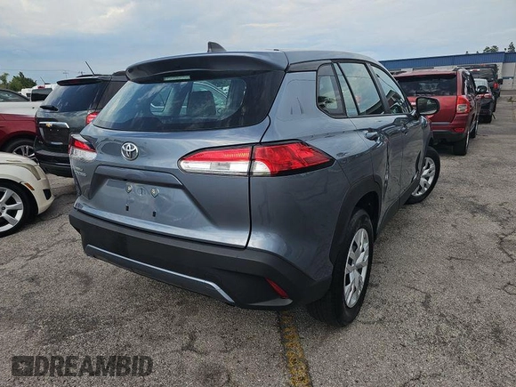 2022 Toyota Corolla Cross L with VIN 7MUAAAAG8NV017626, listed as a IAAI auction lot 42566409 with 49,073 mi miles and . Bid and sale history available at DreamBid. Image 9.