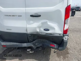 2016 Ford Transit z VIN 1FTYR1YG9GKA12565, wystawiony jako IAAI lot #41969936 z przebiegiem 192 933 mil mil oraz . Historia ofert i sprzedaży dostępna na DreamBid. Obrazek 6.