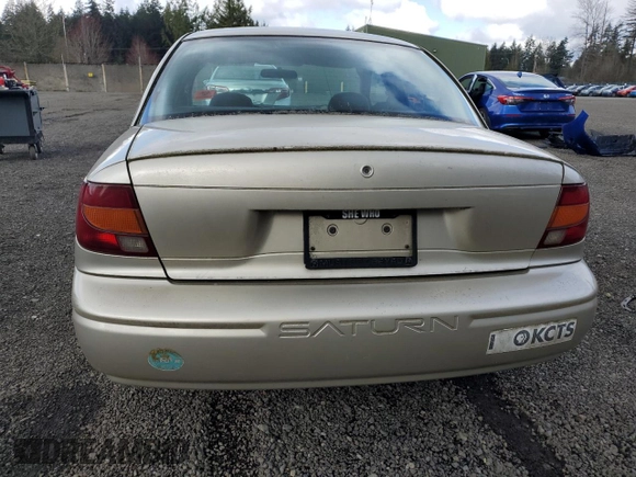 2001 Saturn SL z VIN 1G8ZG52851Z213567, wystawiony jako Copart lot #51795795 z przebiegiem Nie podano mil oraz Szkoda całkowita • Salvage title. Historia ofert i sprzedaży dostępna na DreamBid. Obrazek 6.