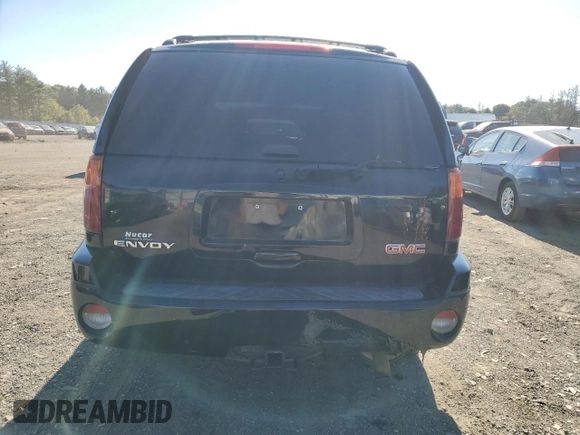 2006 GMC Envoy SLT with VIN 1GKDT13S362266240, listed as a Copart auction lot 75223264 with 159,609 mi miles and Salvage Title. Bid and sale history available at carsss.com. Image 6.