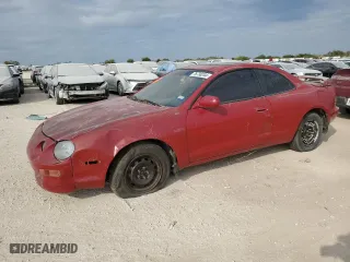 1994 Toyota Celica ST with VIN JT2AT00F9R0023167, listed as a Copart auction lot 76738244 with 220,210 mi miles and Clean Title. Bid and sale history available at carsss.com. Image 1.