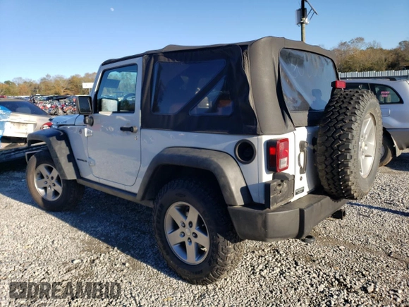 2010 Jeep Wrangler Rubicon with VIN 1J4BA6D17AL132002, listed as a Copart auction lot 83869124 with 183,507 mi miles and Salvage title. Bid and sale history available at DreamBid. Image 2.