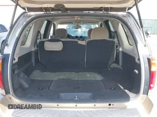 2005 GMC Envoy SLE with VIN 1GKDT13S252264932, listed as a IAAI auction lot 41981566 with 140,566 mi miles. Bid and sale history available at carsss.com. Image 17.