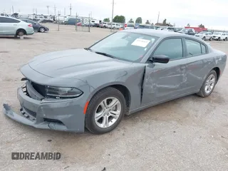 2023 Dodge Charger SXT z VIN 2C3CDXBG4PH663294, wystawiony jako IAAI lot #42376163 z przebiegiem 42 656 mil mil oraz . Historia ofert i sprzedaży dostępna na DreamBid. Obrazek 19.