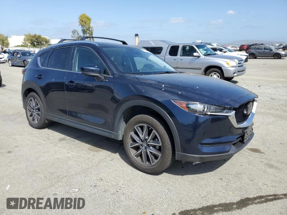 2018 Mazda CX-5 Touring with VIN JM3KFACM6J1323449, listed as a Copart auction lot 54090445 with 93,748 mi miles and Salvage Title. Bid and sale history available at carsss.com. Image 4.