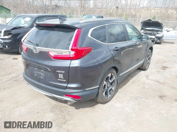 2019 Honda CR-V Touring with VIN 2HKRW2H9XKH636354, listed as a IAAI auction lot 41902615 with 66,781 mi miles and . Bid and sale history available at DreamBid. Image 4.