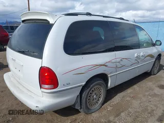 1997 Chrysler Town & Country with VIN 1C4GT64L7VB436658, listed as a IAAI auction lot 41823587 with 184,570 mi miles and . Bid and sale history available at DreamBid. Image 4.