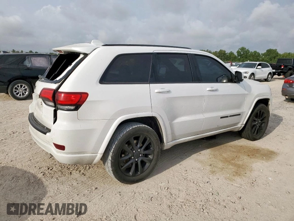 2018 Jeep Grand Cherokee Altitude with VIN 1C4RJEAG1JC397392, listed as a Copart auction lot 58214815 with 118,390 mi miles and Salvage title. Bid and sale history available at DreamBid. Image 3.