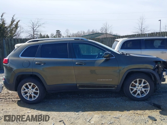2014 Jeep Cherokee Latitude with VIN 1C4PJMCS5EW201462, listed as a IAAI auction lot 41727379 with 170,958 mi miles and . Bid and sale history available at DreamBid. Image 14.