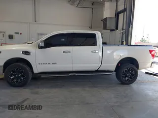 2016 Nissan Titan SL z VIN 1N6BA1F45GN517262, wystawiony jako IAAI lot #42306252 z przebiegiem 141 080 mil mil oraz . Historia ofert i sprzedaży dostępna na DreamBid. Obrazek 15.
