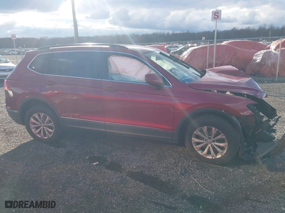 2018 Volkswagen Tiguan SEL with VIN 3VV3B7AX1JM076161, listed as a IAAI auction lot 40931210 with 106,916 mi miles. Bid and sale history available at carsss.com. Image 14.
