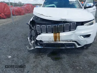 2017 Jeep Grand Cherokee Overland with VIN 1C4RJFCG6HC617770, listed as a IAAI auction lot 42041810 with 119,125 mi miles and . Bid and sale history available at DreamBid. Image 6.