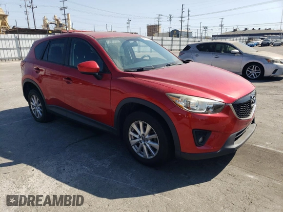 2014 Mazda CX-5 Touring with VIN JM3KE2CY9E0356050, listed as a Copart auction lot 65470674 with 70,400 mi miles and Salvage Title. Bid and sale history available at DreamBid. Image 4.