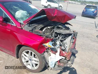 2016 Ford Fusion SE z VIN 3FA6P0H99GR287847, wystawiony jako IAAI lot #42558018 z przebiegiem Nie podano mil oraz . Historia ofert i sprzedaży dostępna na DreamBid. Obrazek 18.