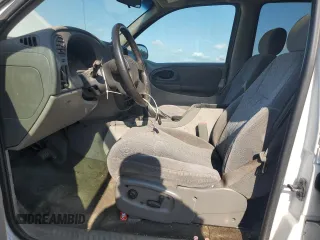 2003 Chevrolet TrailBlazer EXT LT with VIN 1GNES16S936156061, listed as a Copart auction lot 59590264 with 210,543 mi miles and Salvage Title. Bid and sale history available at DreamBid. Image 7.