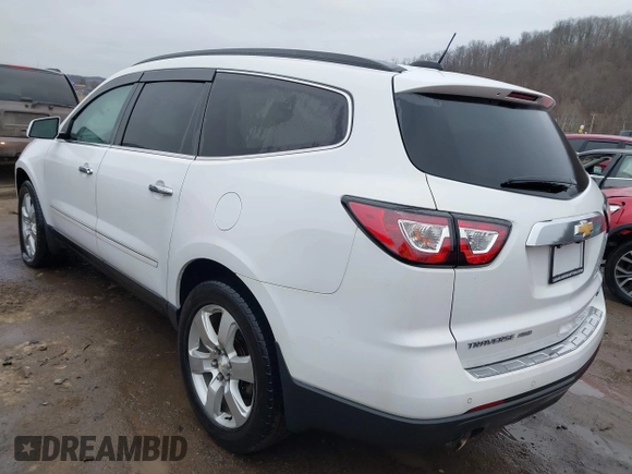 2017 Chevrolet Traverse Premier with VIN 1GNKVJKD5HJ324803, listed as a IAAI auction lot 41464714 with 98,753 mi miles and . Bid and sale history available at DreamBid. Image 3.