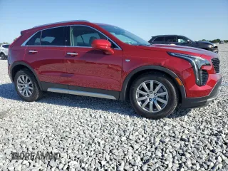 2020 Cadillac XT4 FWD Premium Luxury with VIN 1GYFZCR47LF040062, listed as a Copart auction lot 52309415 with 12,517 mi miles and Salvage title. Bid and sale history available at DreamBid. Image 4.