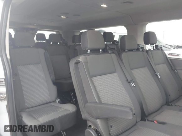 2023 Ford Transit Passenger XL with VIN 1FBAX2Y81PKA57414, listed as a IAAI auction lot 42418993 with 82,592 mi miles and . Bid and sale history available at DreamBid. Image 8.