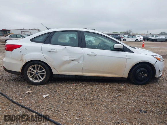 2018 Ford Focus SE z VIN 1FADP3F23JL225333, wystawiony jako IAAI lot #41758445 z przebiegiem 133 307 mil mil oraz . Historia ofert i sprzedaży dostępna na DreamBid. Obrazek 13.
