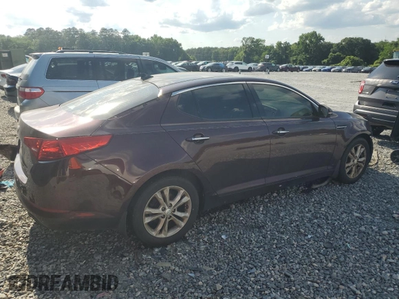 2013 Kia Optima EX z VIN 5XXGN4A77DG138576, wystawiony jako Copart lot #57203965 z przebiegiem 201 406 mil mil oraz Szkoda całkowita • Salvage title. Historia ofert i sprzedaży dostępna na DreamBid. Obrazek 3.