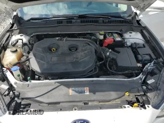 2017 Ford Fusion SE z VIN 3FA6P0H92HR203496, wystawiony jako Copart lot #56719365 z przebiegiem 99 817 mil mil oraz Szkoda całkowita • Salvage title. Historia ofert i sprzedaży dostępna na DreamBid. Obrazek 11.
