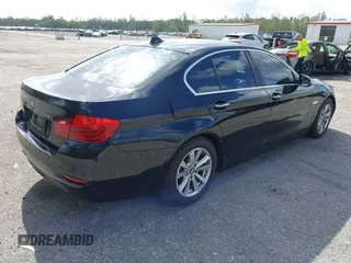 2015 BMW 5 Series 528i with VIN WBA5A5C57FD512845, listed as a IAAI auction lot 41954256 with 174,944 mi miles. Bid and sale history available at carsss.com. Image 4.